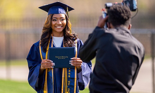 Nearly 700 earn degrees during 159th Commencement